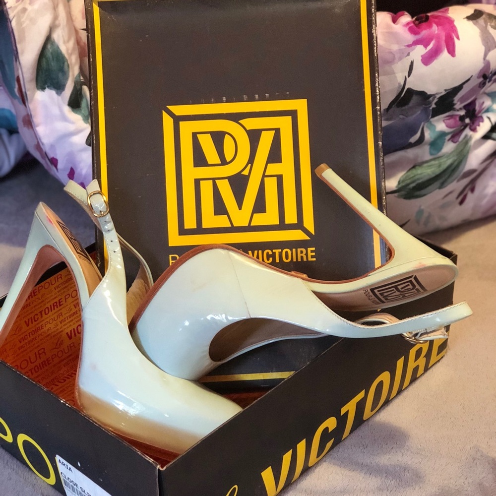 A soft blue closed sling back pump.